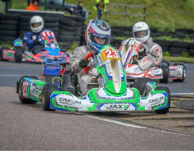 Holly racing karts as part of the Jaxx Motorsport team